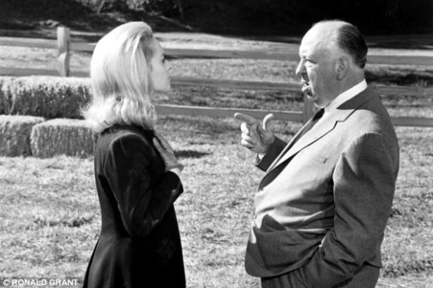 Tippi Hedren and Alfred Hitchcock in on the set of 'Marnie' (note that Hitchcock was slightly taller than Hedren, whereas Toby Jones is shorter than Sienna Miller)