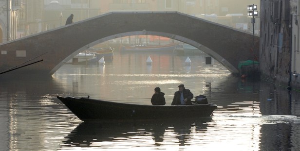 Bepi and Shun Li in his boat.