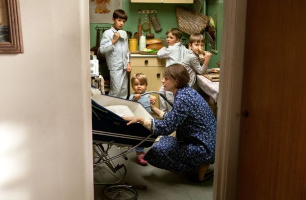 Danuta Walesa at home in the family's tiny flat with the Walesa children.