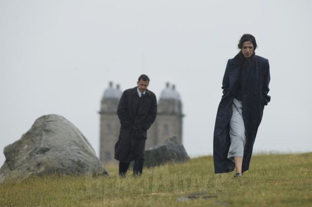 Rebecca Hall (Florence) and Dominic West (Robert) on the moors above the school.