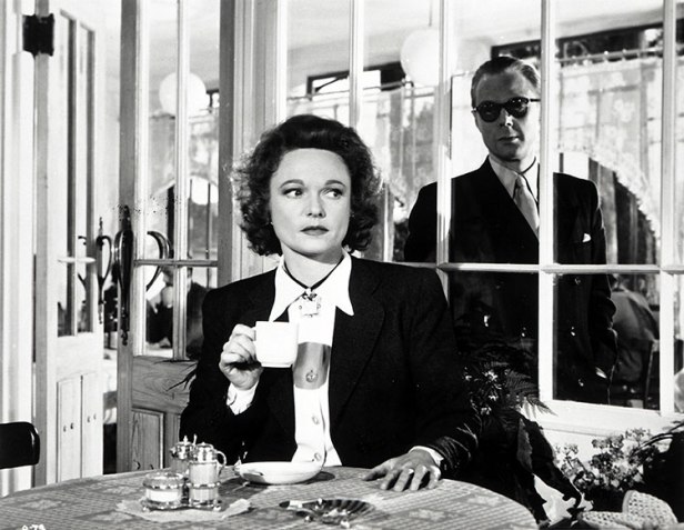 Marius Goring as the German intelligence chief approaches Anna Neagle as Odette