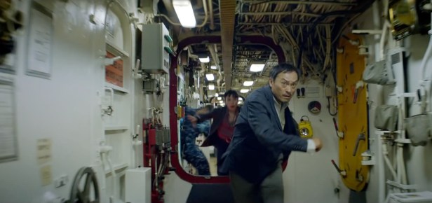 Ken Watanabe and Sally Hawkins as the engineer and scientist rushing to the deck of a US Navy ship to see Godzilla