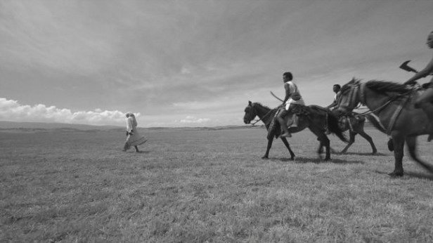 Local men approach Beti offering 'protection' against the Italians.
