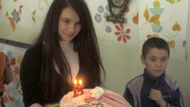 Georgiana with her birthday cake and one of her younger brothers.