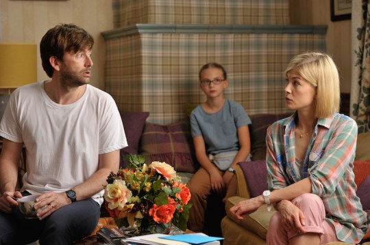 David Tennant and Rosamund Pike with Emilia Jones as Lotte.