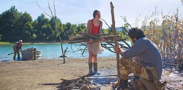 Grandfather watches the girl with the soldier
