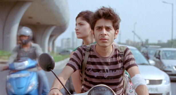 Titli on his scooter with his wife Neelu (Shivani Raghuvanshi)