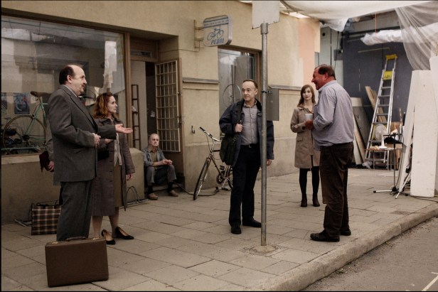 Anderson on set for a scene outside a bicycle shop.