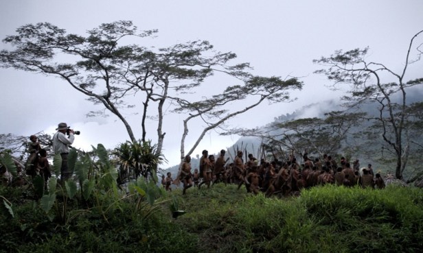 Salgado working on his latest project in the rain forest of Indonesia.