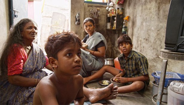 The family watch the new TV sets