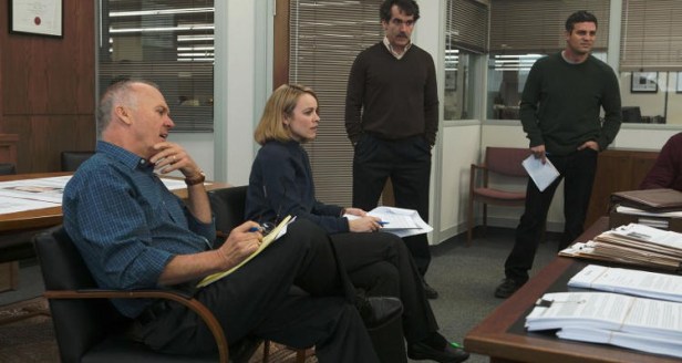 A typical composition of the team being briefed. Much of the film is confined to the Globe building.