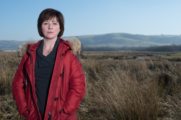 Mared posed against the familiar landscape