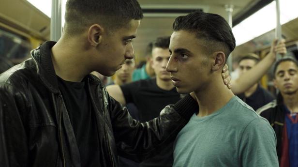 Aboubakr Bensaihi (right) as Marwan with his older brother Nassim (Soufiane Chilah)