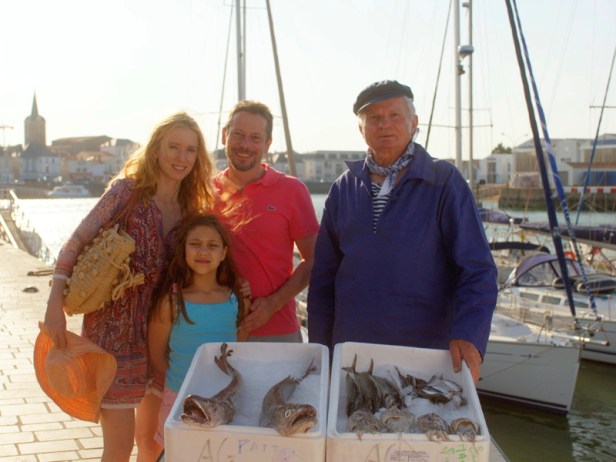 Julien with his wife Delphine and daughter Suzanne on holiday