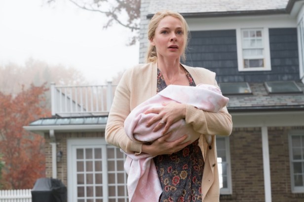 Anna (Rebecca Ferguson) with her baby, Evie – trapped in the town which is a "baby-making factory"?