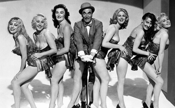 Archie and his dancers, the film suggests that the women are more scantily clad than it was possible to show on screen – thus the suggestion of sleaze